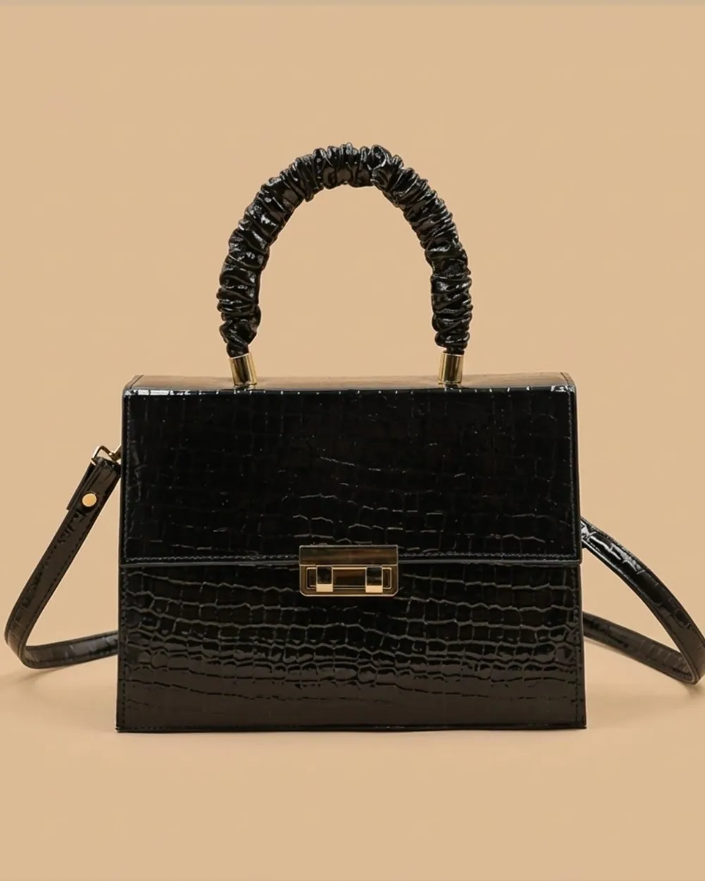 Black croc-textured Leather Crossbody Bag with a gold clasp and gathered top handle