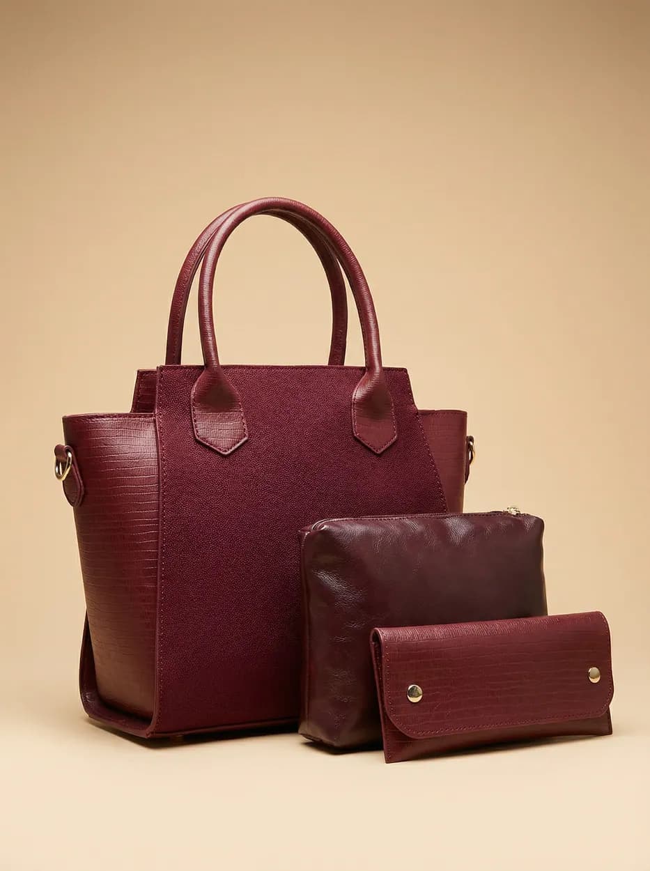 Structured maroon ZARVA tote with a matching pouch and wallet